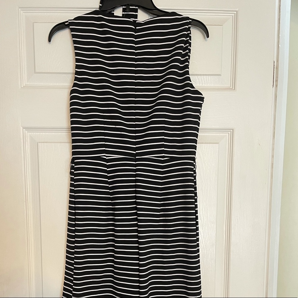 Calvin Klein Striped Jumpsuit. NWT with Defects